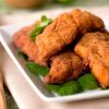 spicy catfish fingers with chopsticks