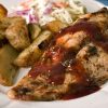 BBQ catfish with potato wedges and coleslaw