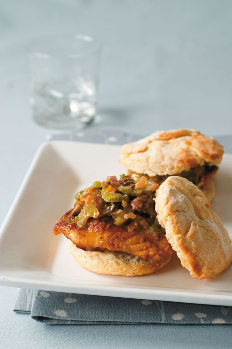 catfish biscuits topped with greens