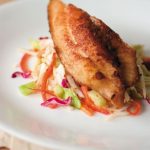 cinnamon chipotle catfish on bed of slaw