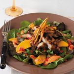 Jamaican jerk catfish salad with fresh mango and dressing