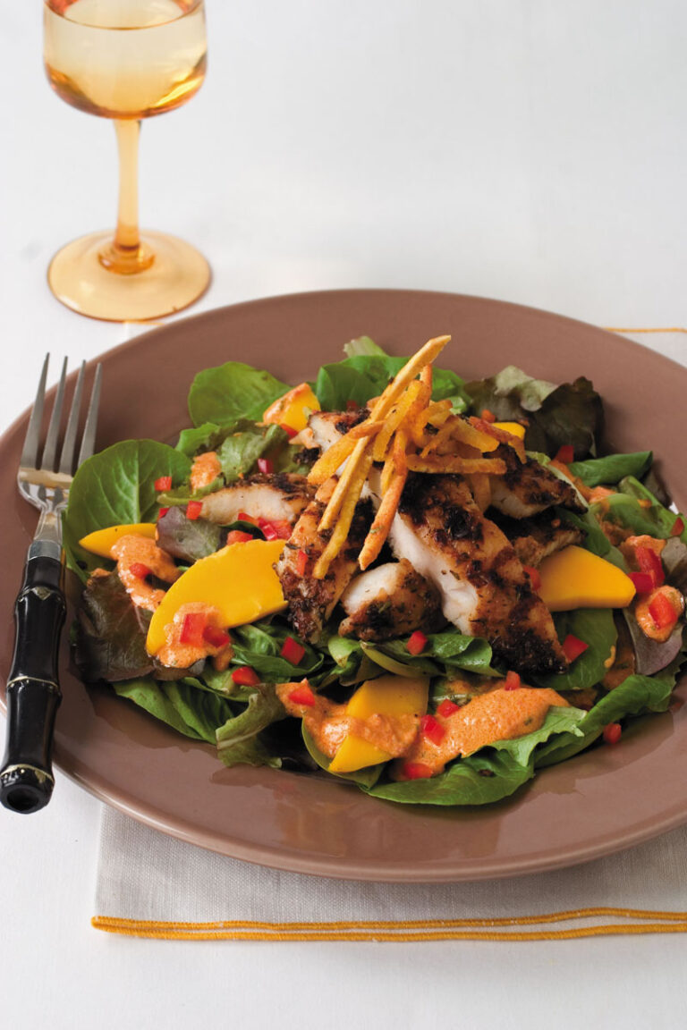 Jamaican jerk catfish salad with fresh mango and dressing