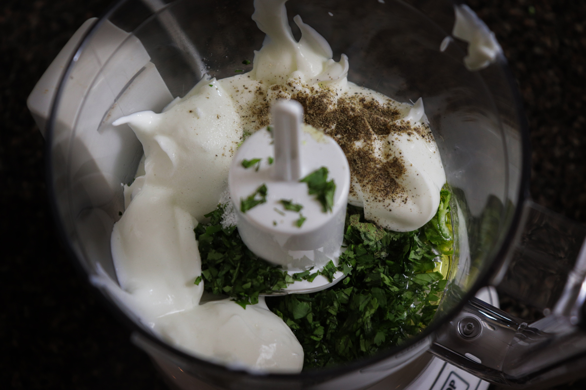 Sour cream, cilantro and pepper in blender