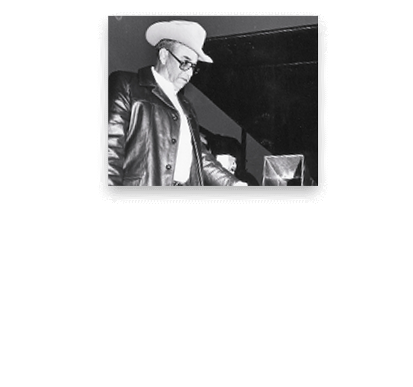 Black and white photo of William Tackett at industry event