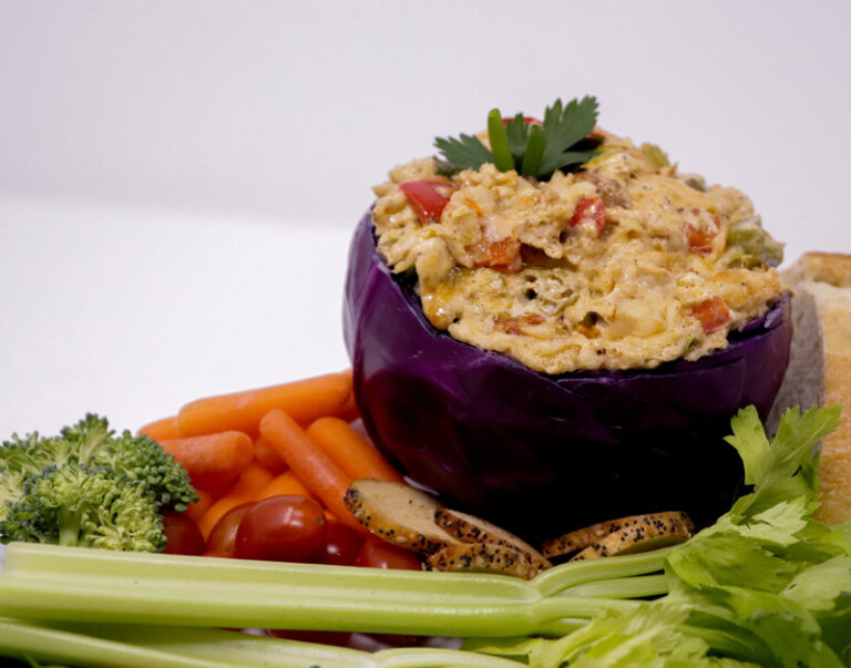 Catfish gumbo dip with fresh veggies and crackers