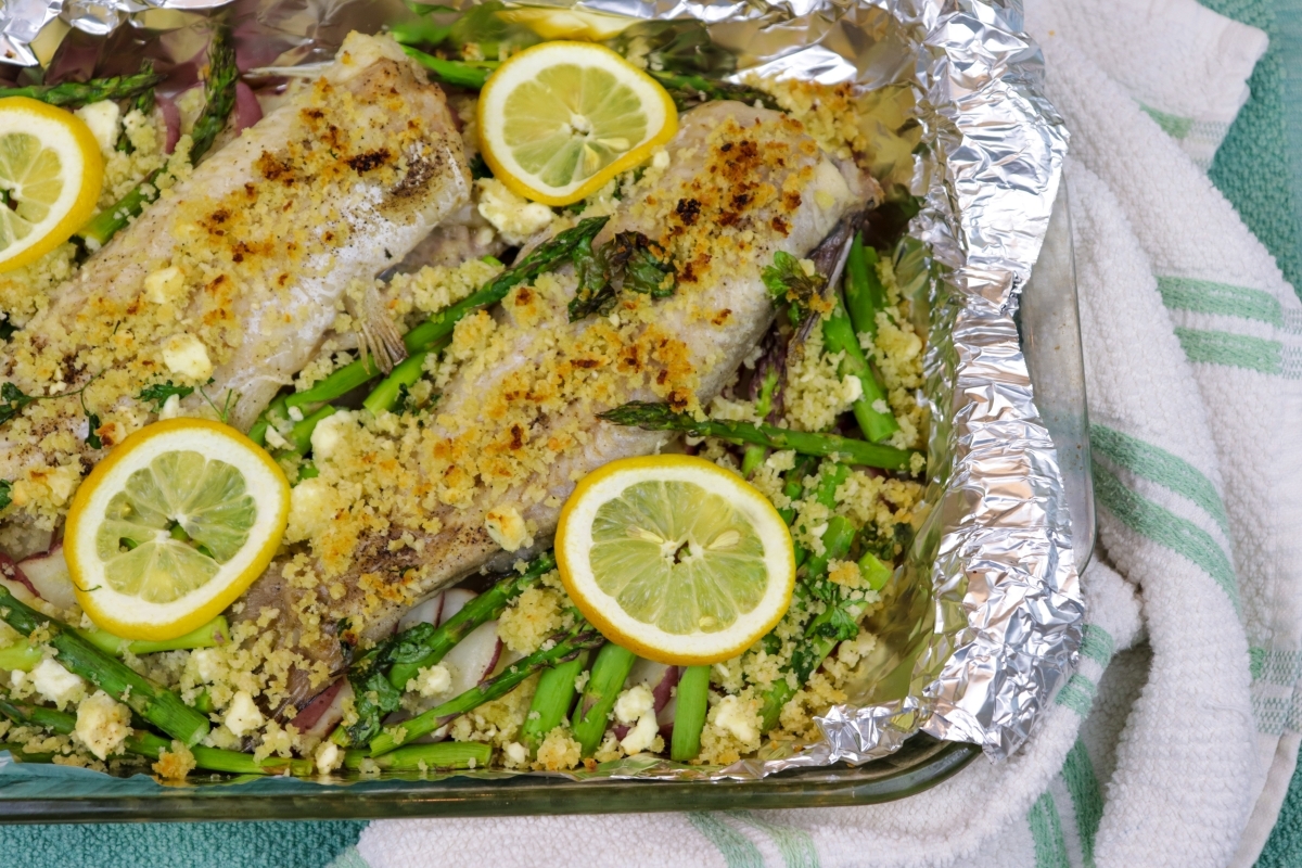 Finished baked catfish with asparagus and red potatoes