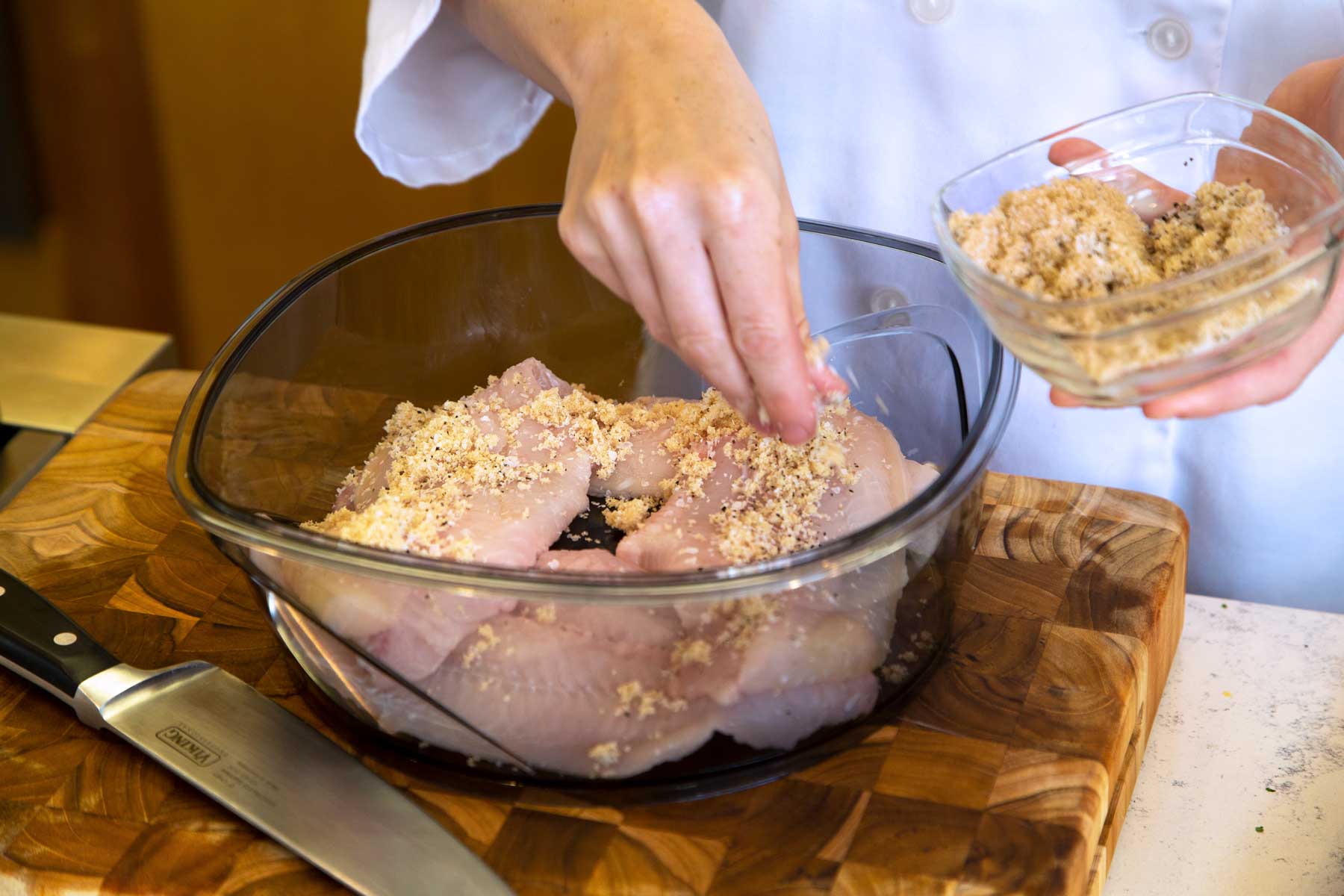 Breading Catfish fillets in a bowl