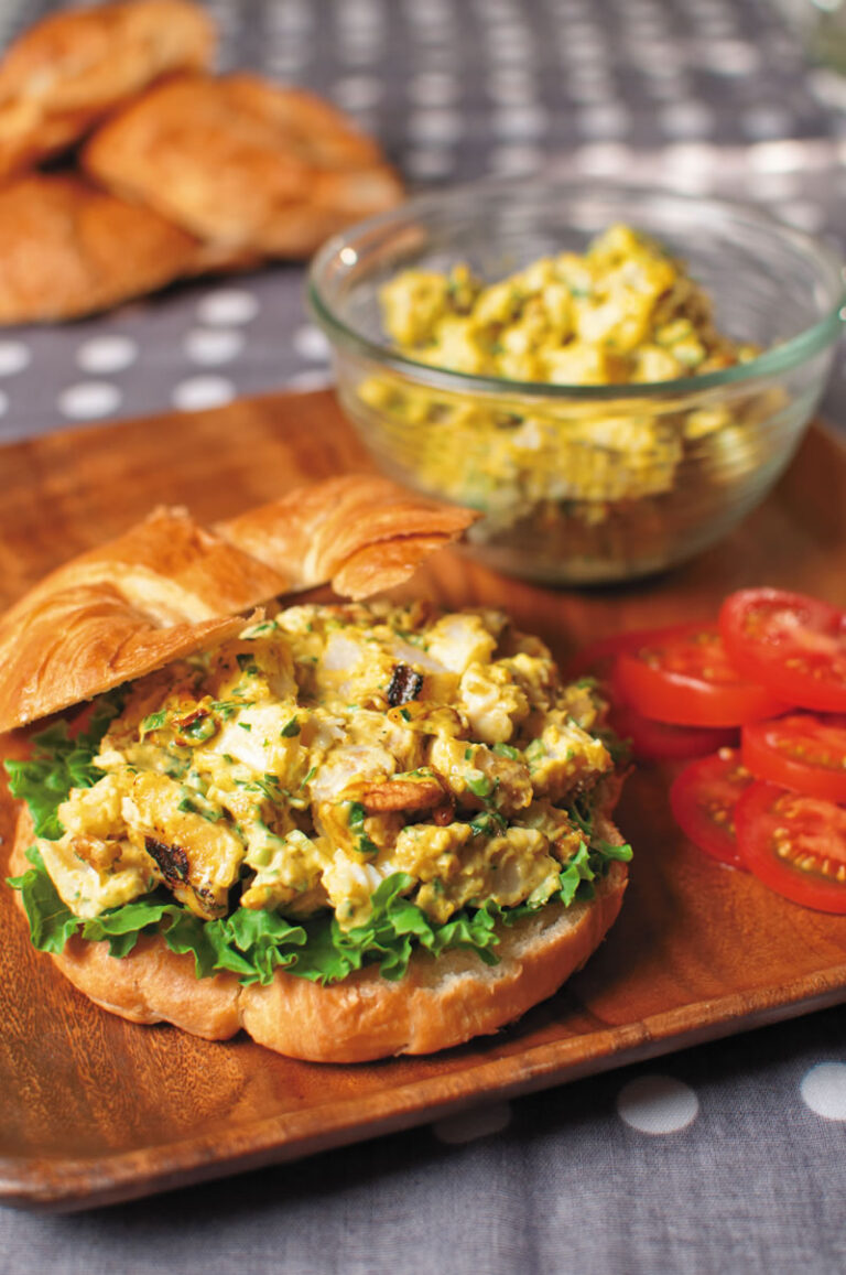 curry catfish salad on croissant with lettuce and tomato