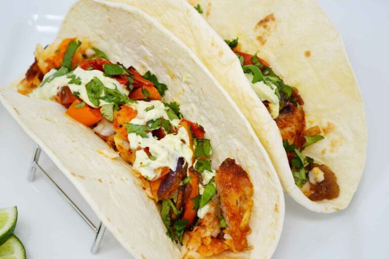 Catfish Tacos topped with dressing
