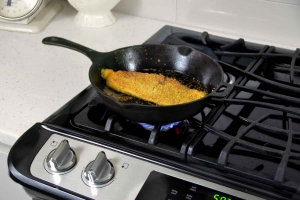cooking breaded catfish on stove