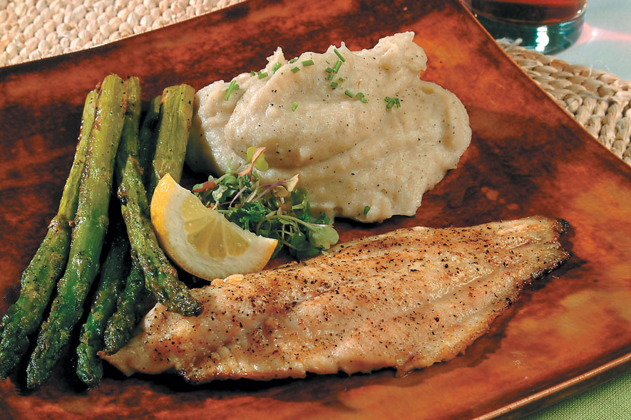 Broiled Catfish lightly seasoned with mashed potatoes and asparagus