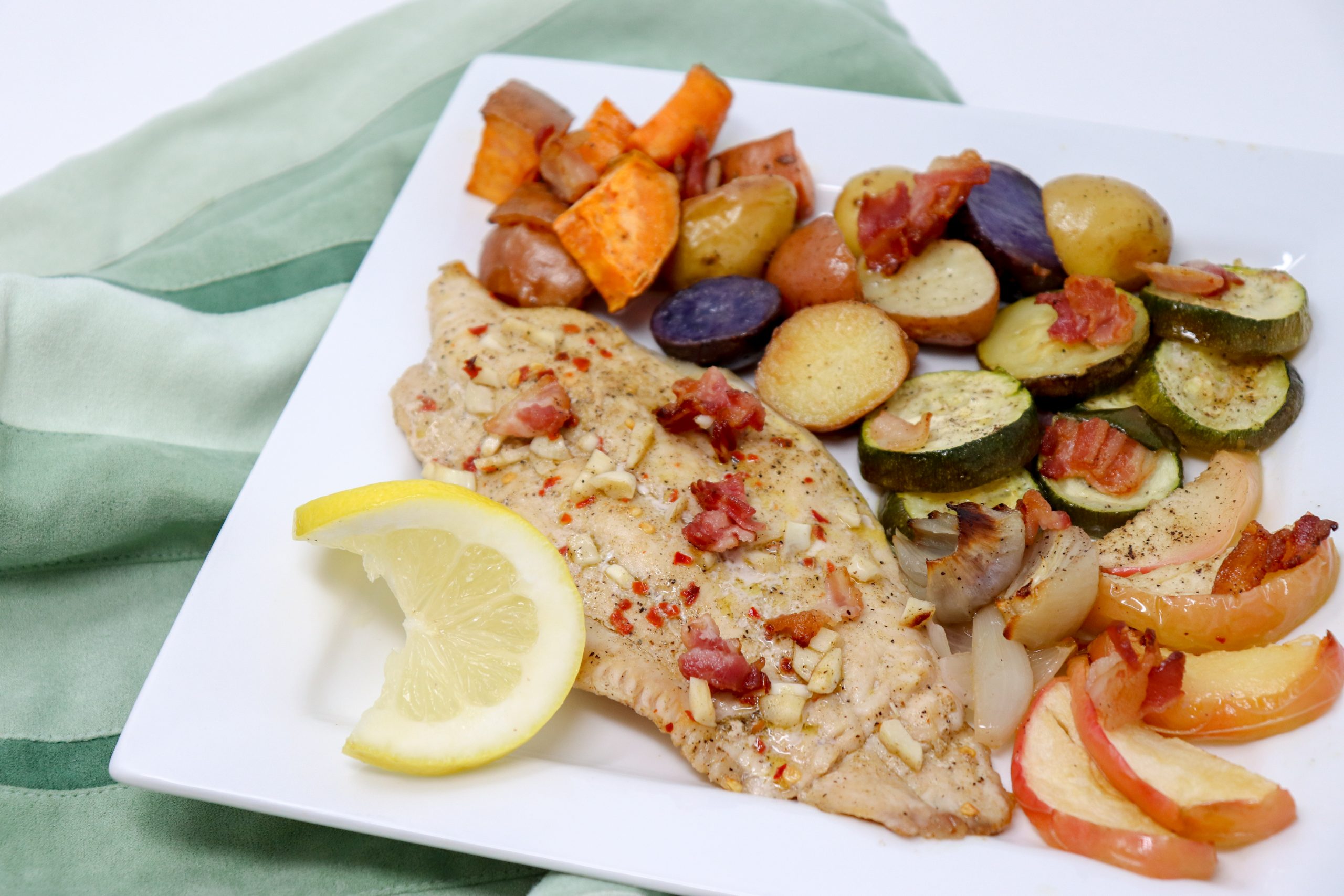 Roasted Veggies and Catfish on a plate