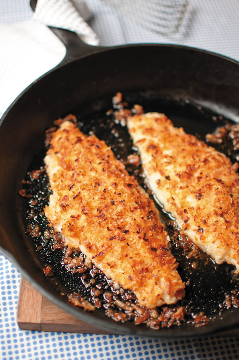 Onion Crusted Catfish cooking in cast iron skillet