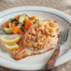 Seafood Stuffed Catfish with veggies on a plate