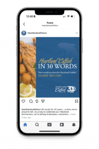Cell phone with Heartland Catfish social media graphic promoting 30th anniversary campaign