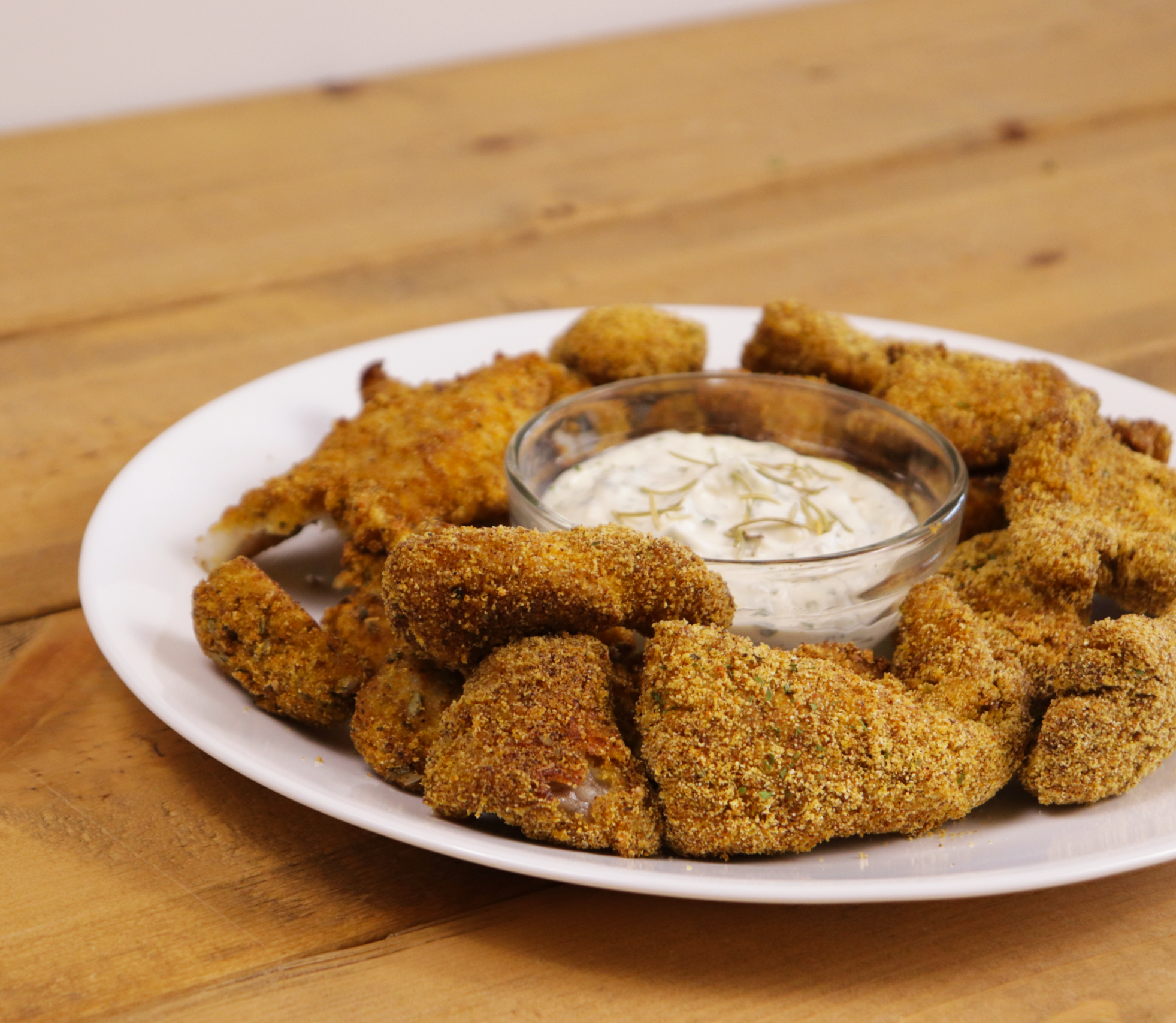 Breaded U.S. Farm-Raised Catfish nuggets served with a creamy dipping sauce
